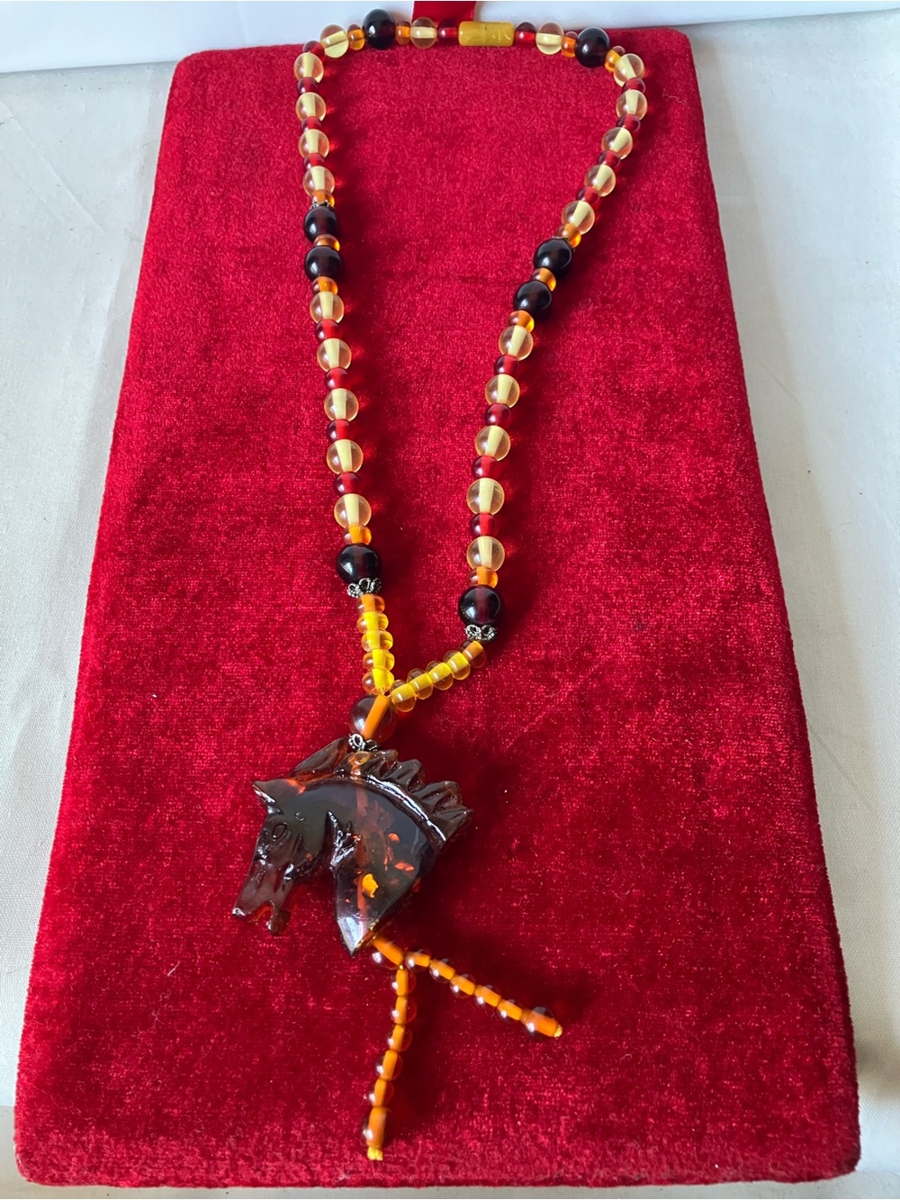Amber Horse Pendant Necklace Multi Tone Carved Equine Round Beads.